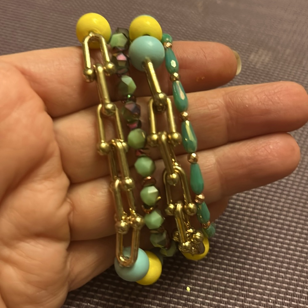 Erimish stack of 4 stretch beaded bracelets.